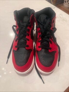 Nike Air Jordan 1 Mid Red and Black High-Top Sneakers